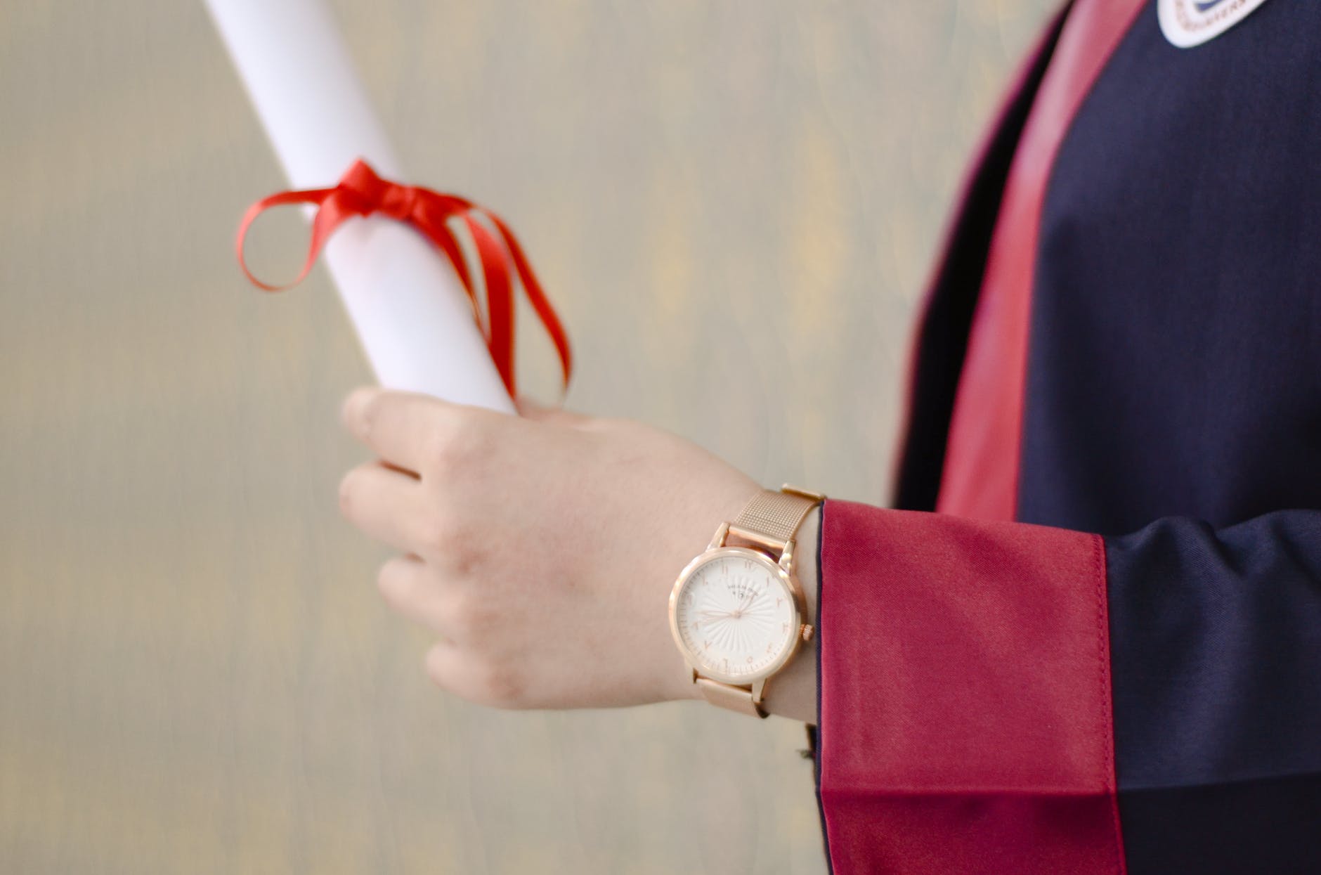 person wearing analog watch