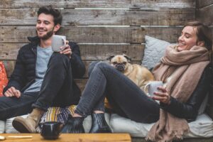 man woman dog pet pug owners 2425121