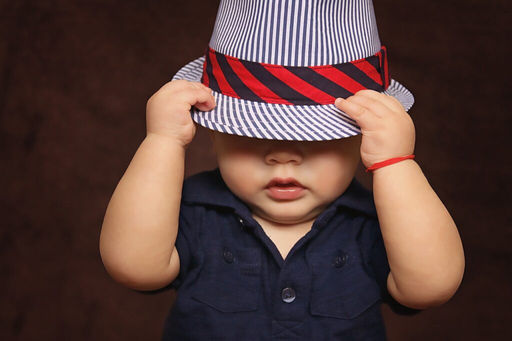 baby boy hat covered child 1399332
